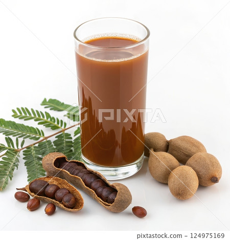 Refreshing tamarind juice in a glass Refreshing tamarind juice in a glass 124975169