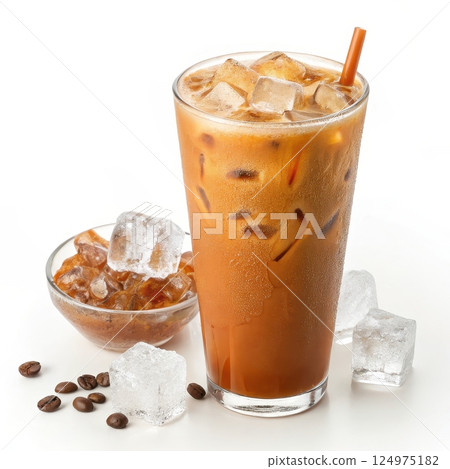 Orange Thai iced tea with a creamy sweet flavor and frothy texture served over ice in a refreshing glass 124975182