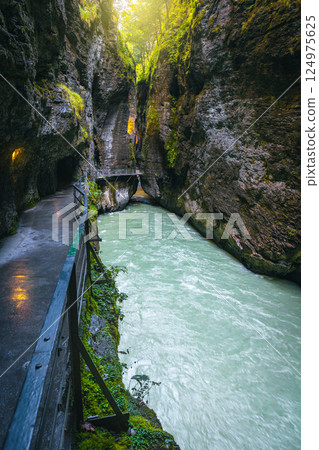 Famous hiking pathway with Aare river in the Aare gorge Famous hiking pathway with Aare river in the Aare gorge 124975625