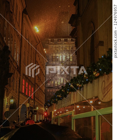 Snowy European cityscape at night 124976957