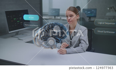 Female Engineer Uses Augmented Reality to Visualize 3D Holographic Model of Cybernetic Brain 124977363