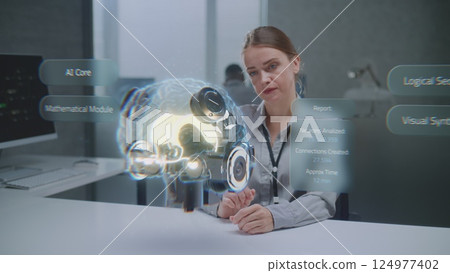 Female Engineer Uses Augmented Reality to Visualize 3D Holographic Model of Cybernetic Brain Female Engineer Uses Augmented Reality to Visualize 3D Holographic Model of Cybernetic Brain 124977402