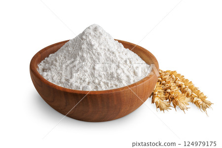 wheat flour in wooden bowl and ears near isolated on white background wheat flour in wooden bowl and ears near isolated on white background 124979175