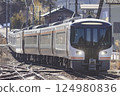 Hida Express train passing through Hida Ichinomiya Station 124980836