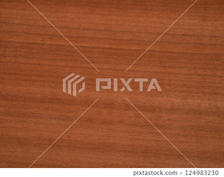Moabi veneer with seamless straight grain and rich reddish-brown warmth Moabi veneer with seamless straight grain and rich reddish-brown warmth 124983230
