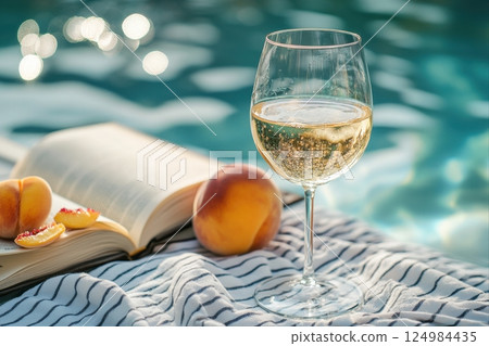 Refreshing white wine by the poolside summer vibes relaxation outdoor close-up leisure Refreshing white wine by the poolside summer vibes relaxation outdoor close-up leisure 124984435