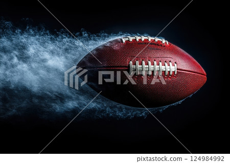Dynamic football throw sports field action shot dark background close-up energy burst Dynamic football throw sports field action shot dark background close-up energy burst 124984992