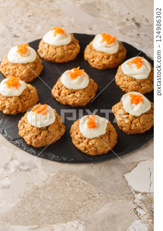 Cream Cheese Carrot Cake Cookies close up on the plate. Vertical 124986302