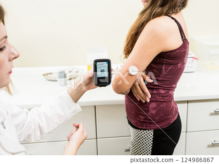 Medical device for glucose check. Continuous glucose monitoring pod. Medical device for glucose check. Continuous glucose monitoring pod. 124986867