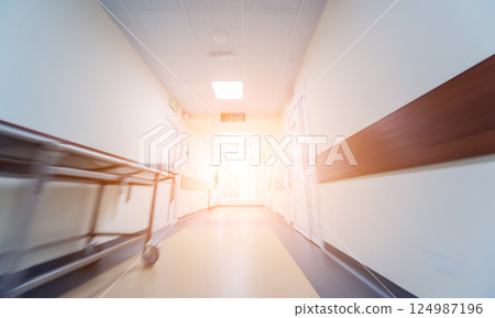 Empty long corridor in the modern clinic. Empty long corridor in the modern clinic. 124987196