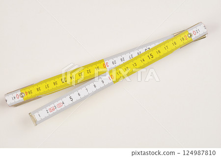 Wooden folding ruler 124987810