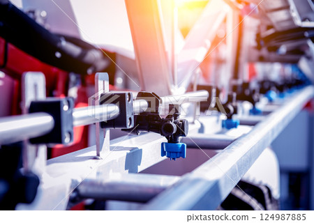 Modern agricultural machinery and equipment. Industrial details. Modern agricultural machinery and equipment. Industrial details. 124987885