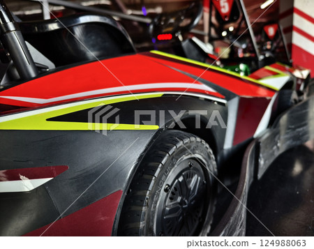 New electric go karts in the modern indoor racing track 124988063