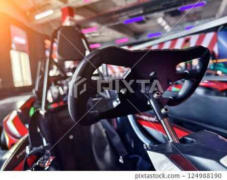 New electric go karts in the modern indoor racing track 124988190