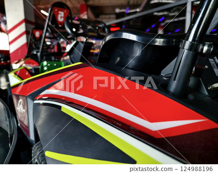 New electric go karts in the modern indoor racing track 124988196