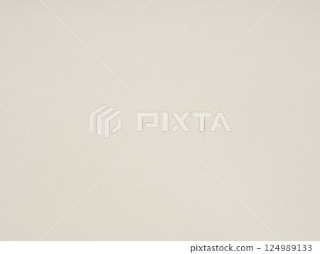 Unruffled whispers of ivory, the paper's texture promises tales untold amidst its understated canvas 124989133