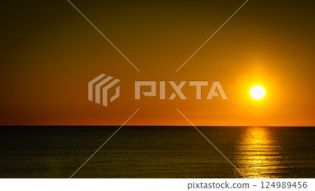 Sunrise over sea 124989456