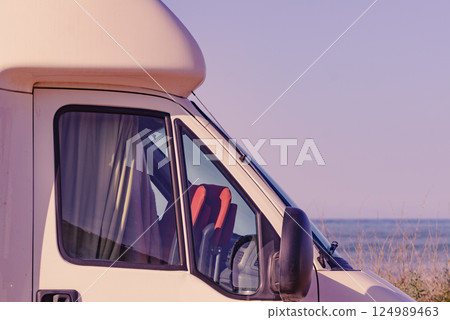 Rv motor home camping on beach 124989463