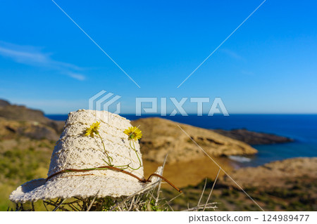 Summer hat on sunny sea coast, Murcia Spain Summer hat on sunny sea coast, Murcia Spain 124989477