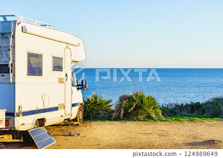 Solar photovoltaic panel at caravan on beach Solar photovoltaic panel at caravan on beach 124989649