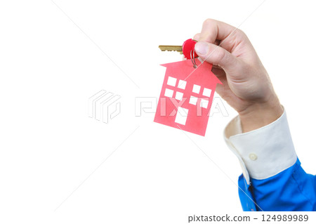 Man hand holding home keys Man hand holding home keys 124989989