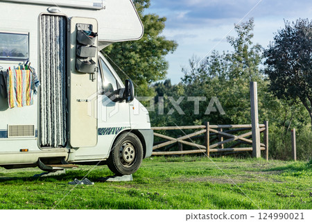 Rv motorhome on nature. Holidays trip. 124990021