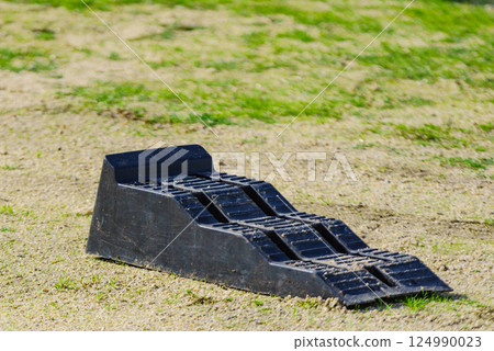 Camper leveling block outdoors. Camper leveling block outdoors. 124990023