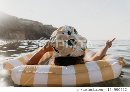 Woman Inflatable Raft Sea Pointing Woman Inflatable Raft Sea Pointing 124990312