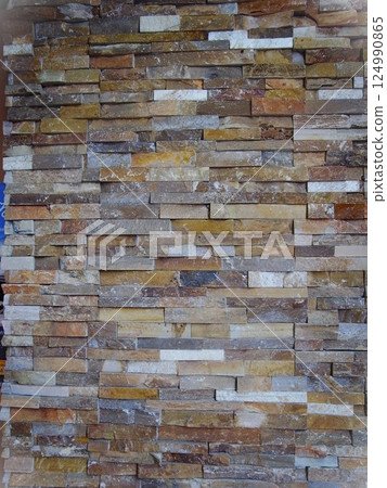 A graphically colorful block wall for a detached house A graphically colorful block wall for a detached house 124990865