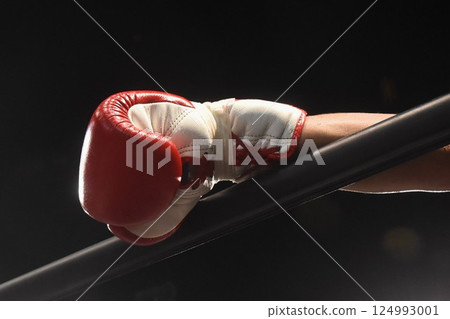 red and white boxing glove push on ring robe for brake whie competitor take count in night 124993001