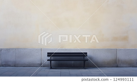 Minimalistic image of a black wooden bench against a stone beige wall with a metal frame. Surrounding by light grey elements, the composition exudes peace and tranquility 124993111