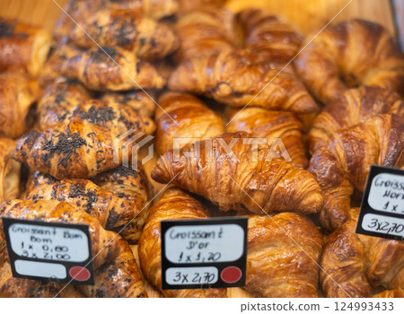 Bakery confectionery shop products - croissants, crescent rolls and buns Bakery confectionery shop products - croissants, crescent rolls and buns 124993433
