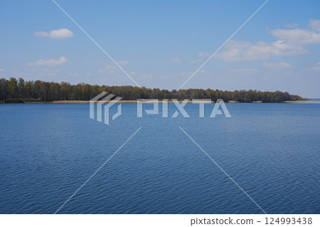 Shoreline on horizon at lake in Goczalkowice town in Poland 124993438