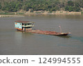 Sand transport ship in Laos 124994555