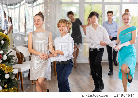 Boys and girls dancing folk dances in studio 124994614
