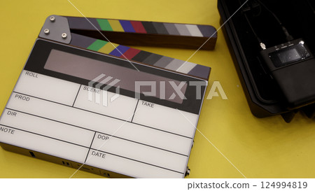 Digital Clapper Board for filmmaker in set. Timecode Slate to use in professional Video Production. Digi number clapperboard or film slates on set. Tools in movie shooting and modern cinema industry. 124994819