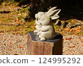 Praying rabbit statue 124995292