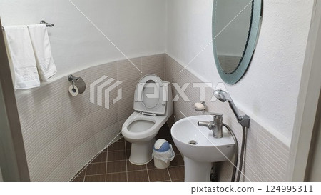 interior of a bathroom with toilet interior of a bathroom with toilet 124995311