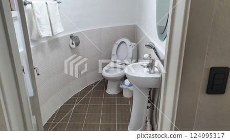 interior of a bathroom with toilet 124995317