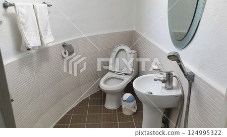 interior of a bathroom with toilet 124995322