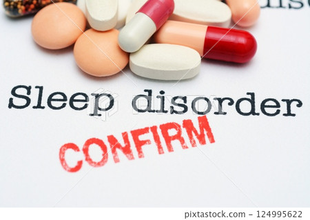 Sleep disorder and pills concept 124995622