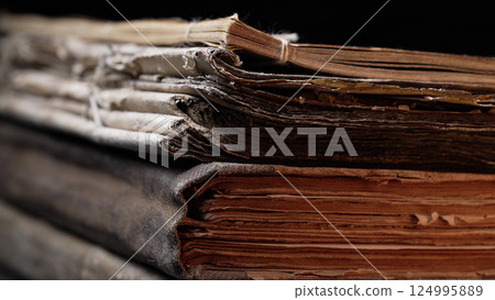 Aged Book Spines In Macro. Vintage Texture, Timeworn Details. Frayed edges pages 124995889