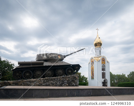 War memorial with old soviet tank and small orthodox chapel, Tiraspol, Transnistria, Moldova, Europe War memorial with old soviet tank and small orthodox chapel, Tiraspol, Transnistria, Moldova, Europe 124996310