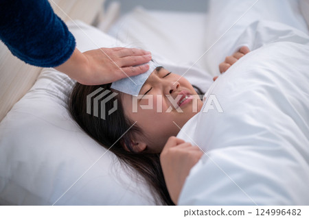 Girl being nursed 124996482