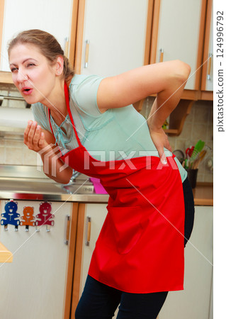 Woman suffering from backache back pain. 124996792