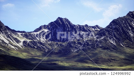 Breathtaking view of rugged mountains under a clear blue sky 124996992
