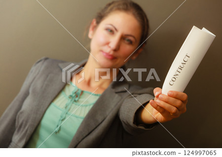 Business woman showing contract Business woman showing contract 124997065