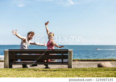 Happy couple man and woman dating outdoor. 124997145
