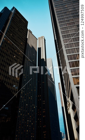 Looking Up at Skyscrapers in New York City Looking Up at Skyscrapers in New York City 124997509