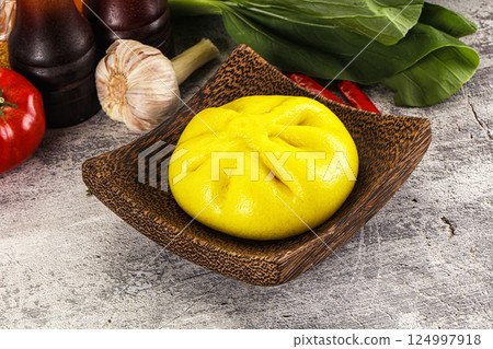 Asian stuffed steamed Bun Bao 124997918